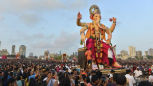 Highlight Ganesha’s role as a symbol of wisdom, intelligence, and remover of obstacles