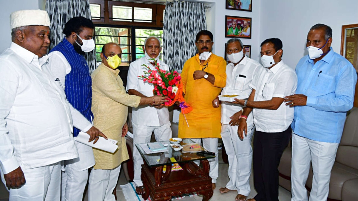 Chief Minister B.S. Yediyurappa and other BJP leaders congratulate each other, in Bengaluru on Tuesday. (ANI Photo)