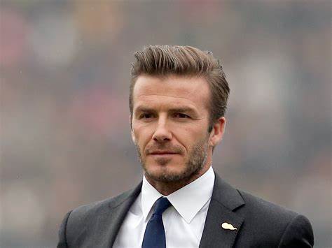 Beckham waits 12-hr in line to mourn Queen