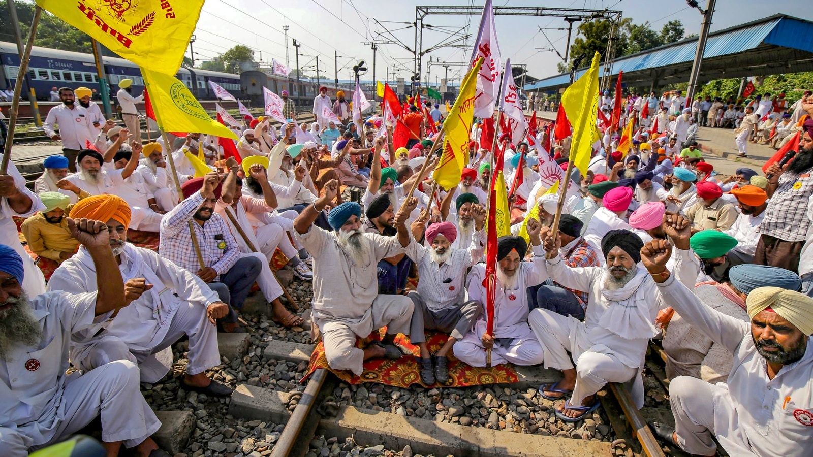 Farmers in Punjab demonstrate action in the Lakhimpur Kheri case by blocking rail tracks for three hours.