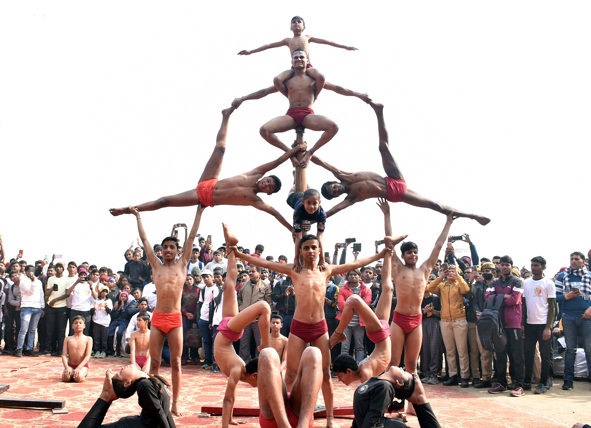 Participants perform Mallakhamba during the inauguration of MP sports competition