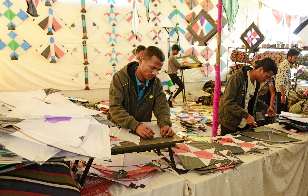 Workers making kites ahead of Makar Sankranti