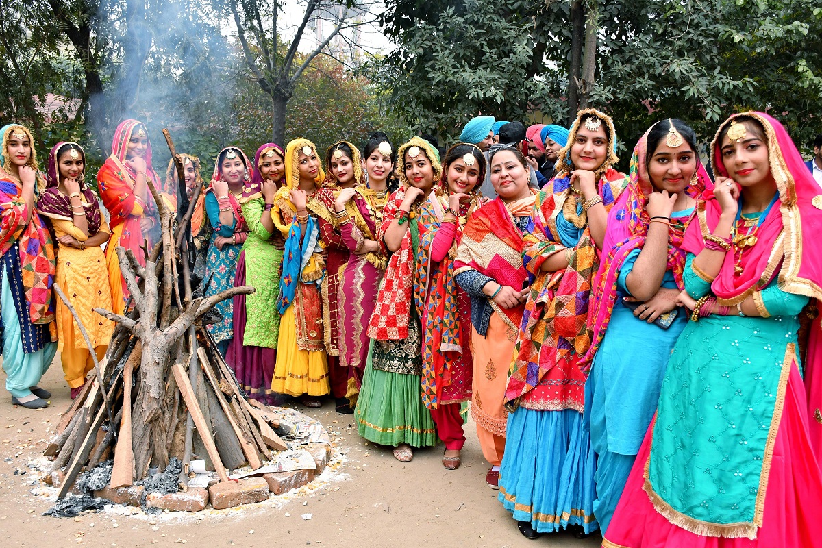 Jalandhar: Students celebrate around the bonfire during the Lohri celebrations