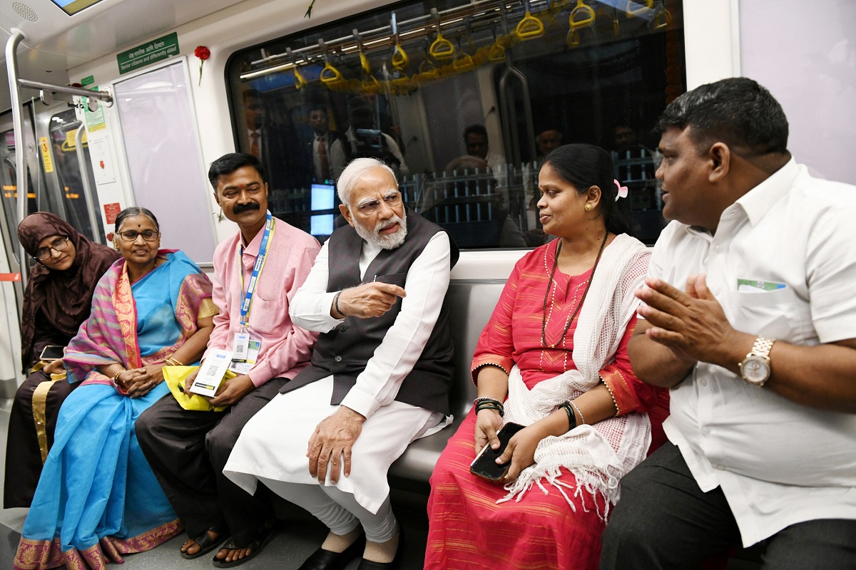 Narendra Modi takes a metro ride from Gundavali Metro Station to Mogra