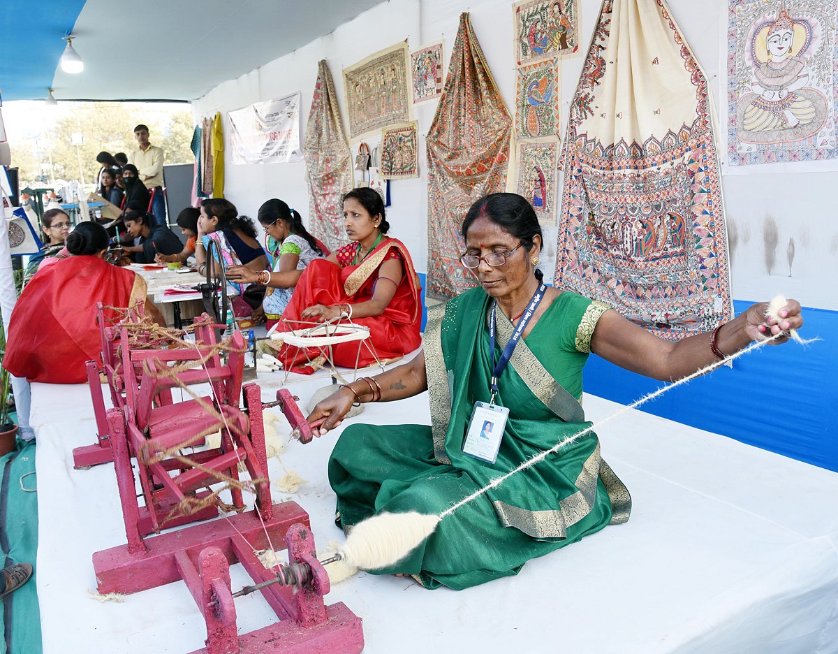 Khadi Village Industries Exhibition: Craftswomen spinning the Charkha