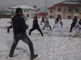 Kashmir girls practice amidst heavy snowfall due to lack of facilities