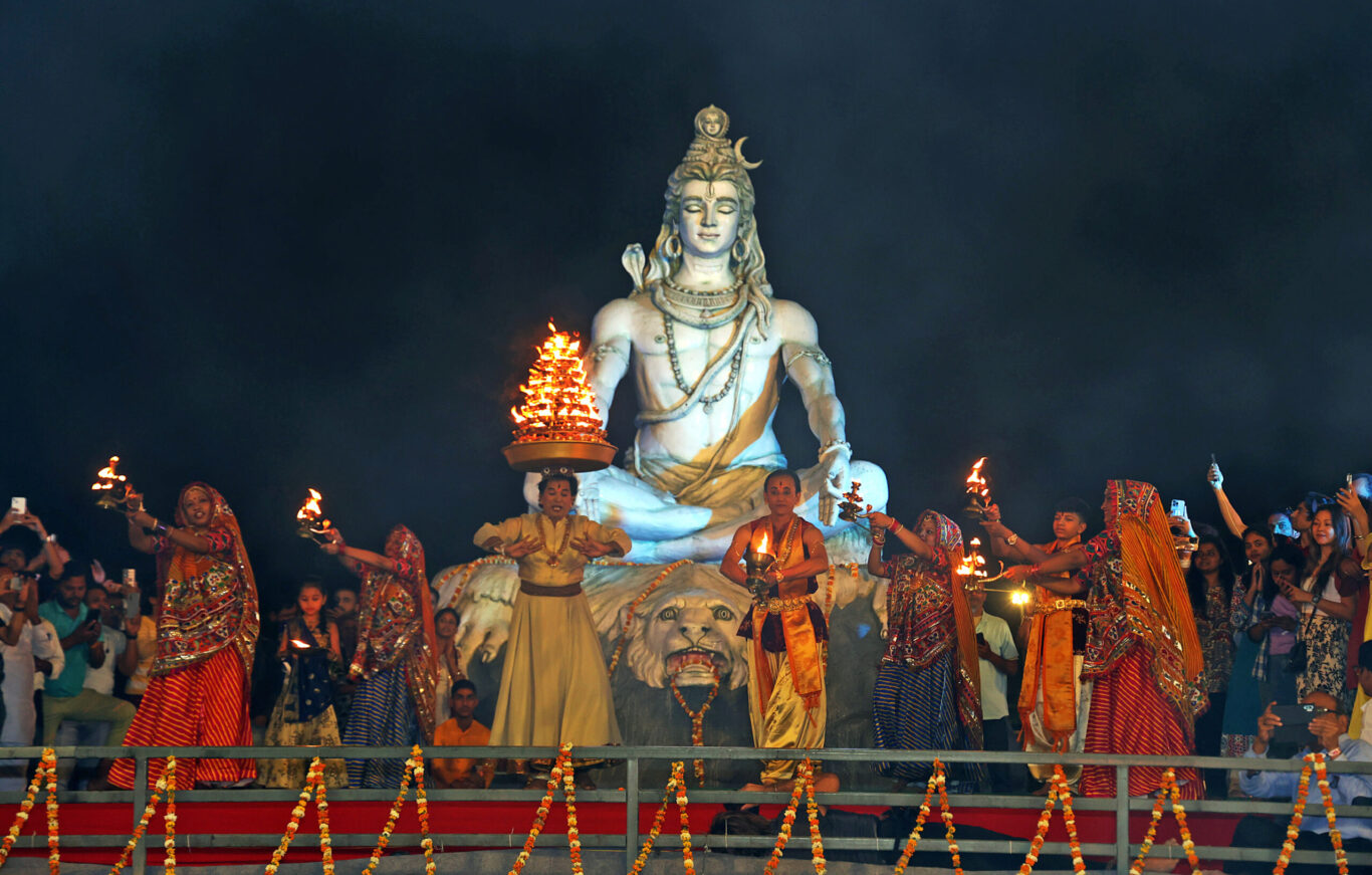 Artists perform Ganga aarti during the 35th International Yoga Festival at Parmarth Niketan in Rishikesh