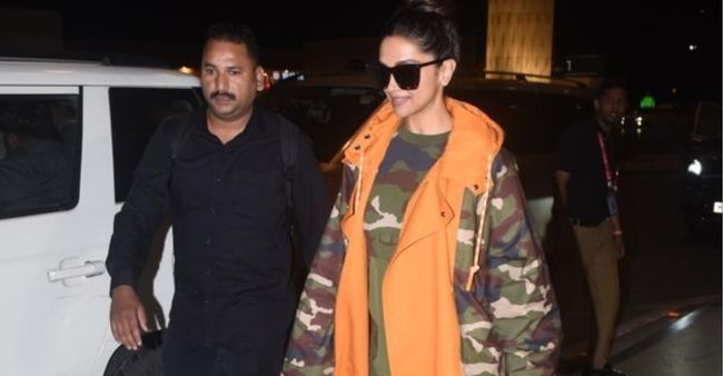 Amid rumours of separation with Ranveer Singh, Deepika Padukone aces airport look in a long camouflage jacket