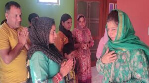 PDP President Mehbooba Mufti during her visit to Dangri to offer condolences to bereaved families of militant attack victims, in Rajouri on Tuesday.