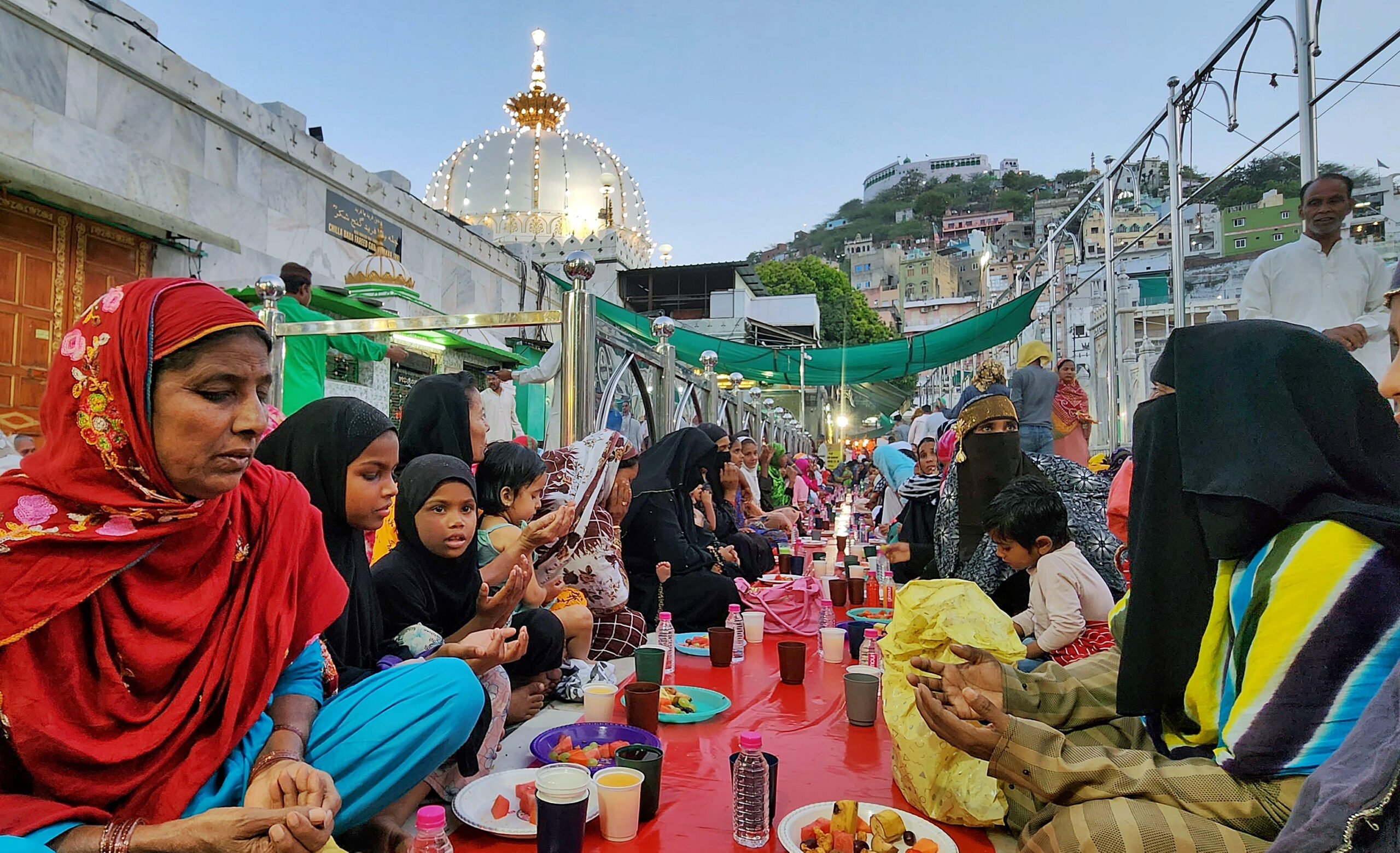 Devotees break their fast (Roza) with Iftar during month of Ramadan