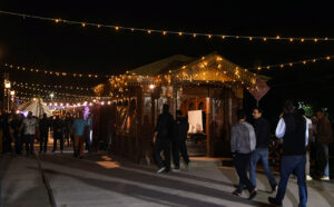 People visit a market during the month of Ramadan