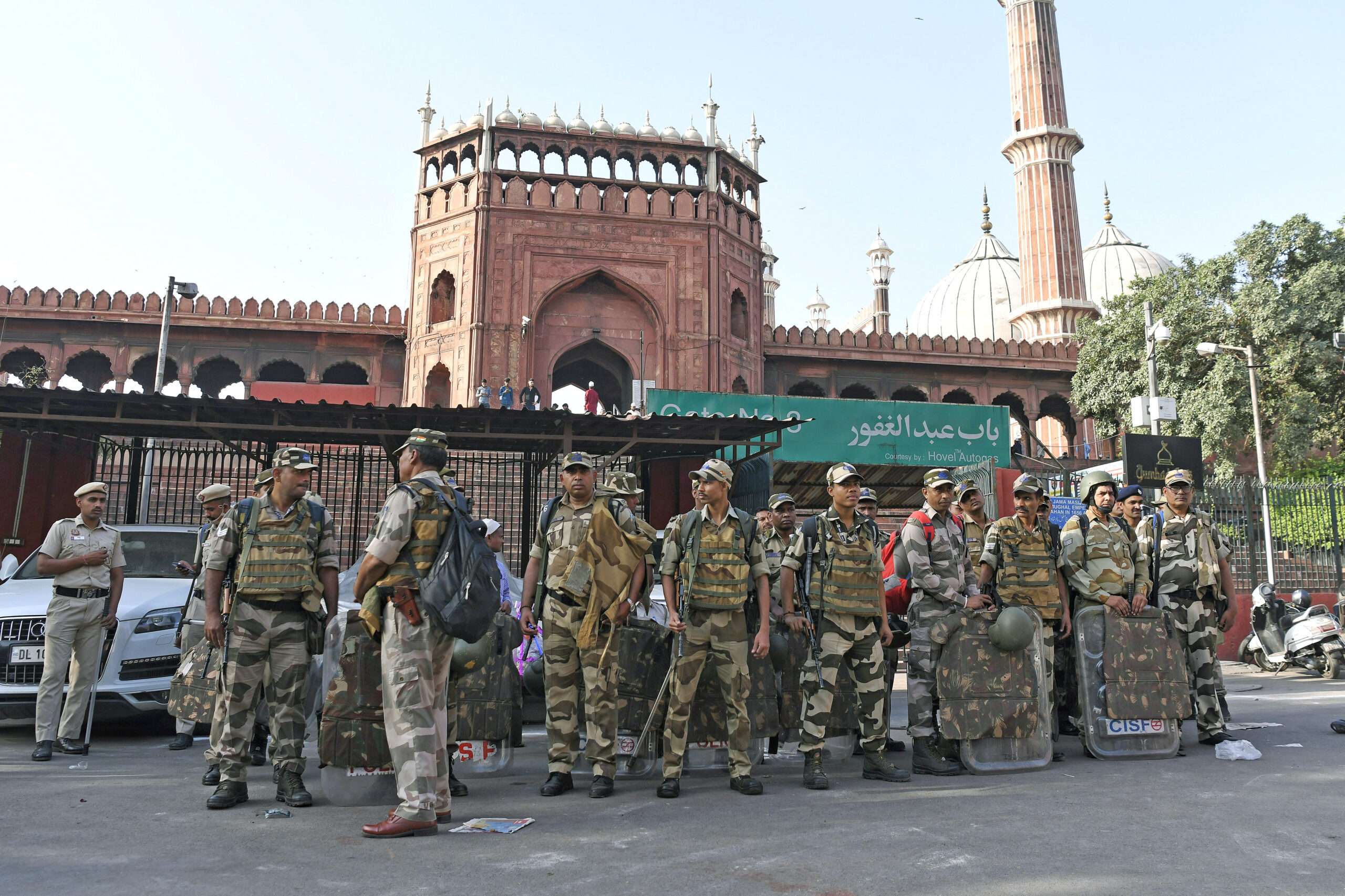 Security personnel stand guard outside the Jama Masjid on the occasion of Eid-ul-Fitr, in Delhi on Saturday.