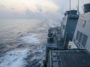 US Navy destroyer sails near contested island in South China Sea militarized by Beijing