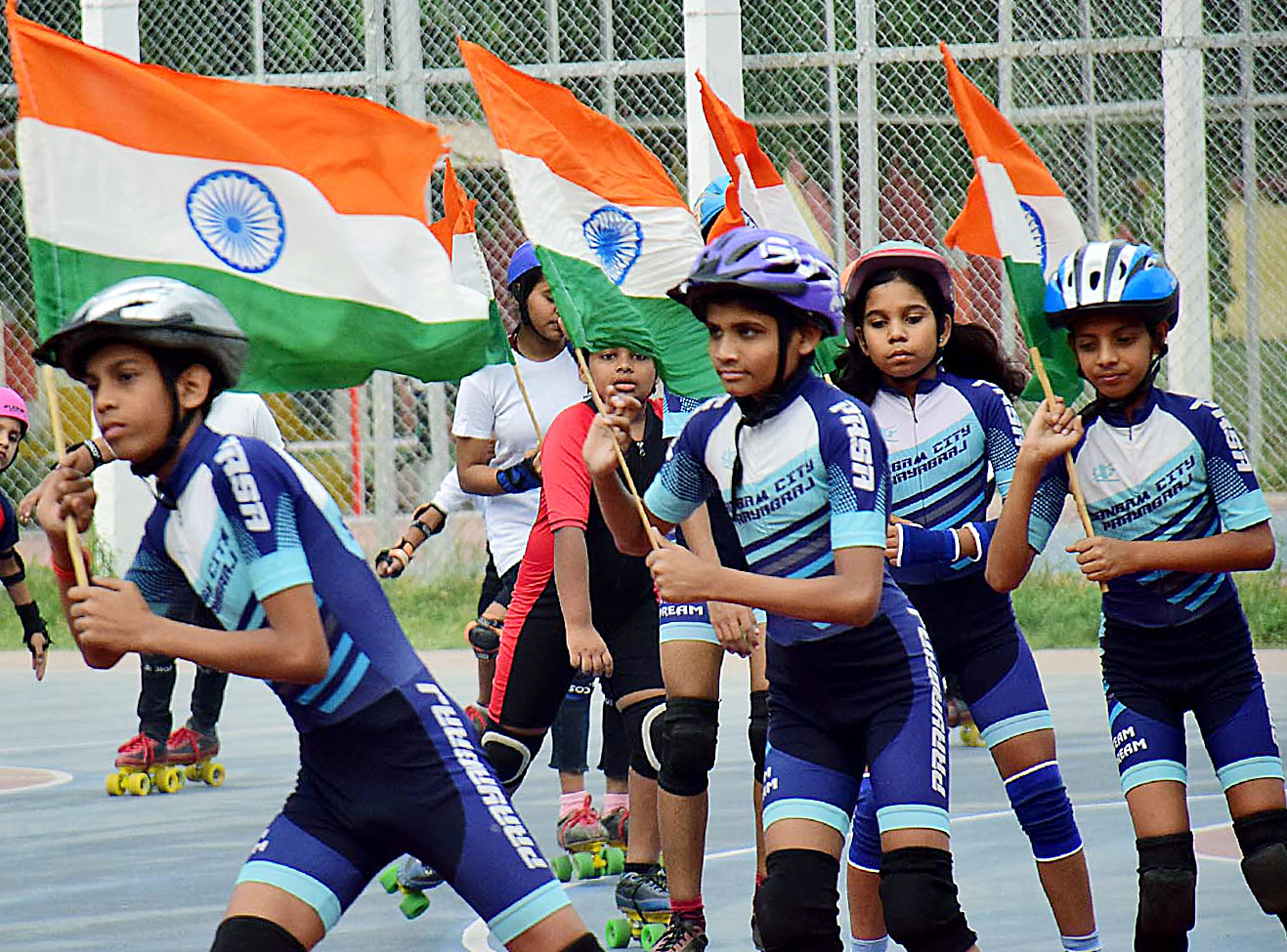 People take part in the 3rd Khelo India University Games’ “Shakti” torch relay.