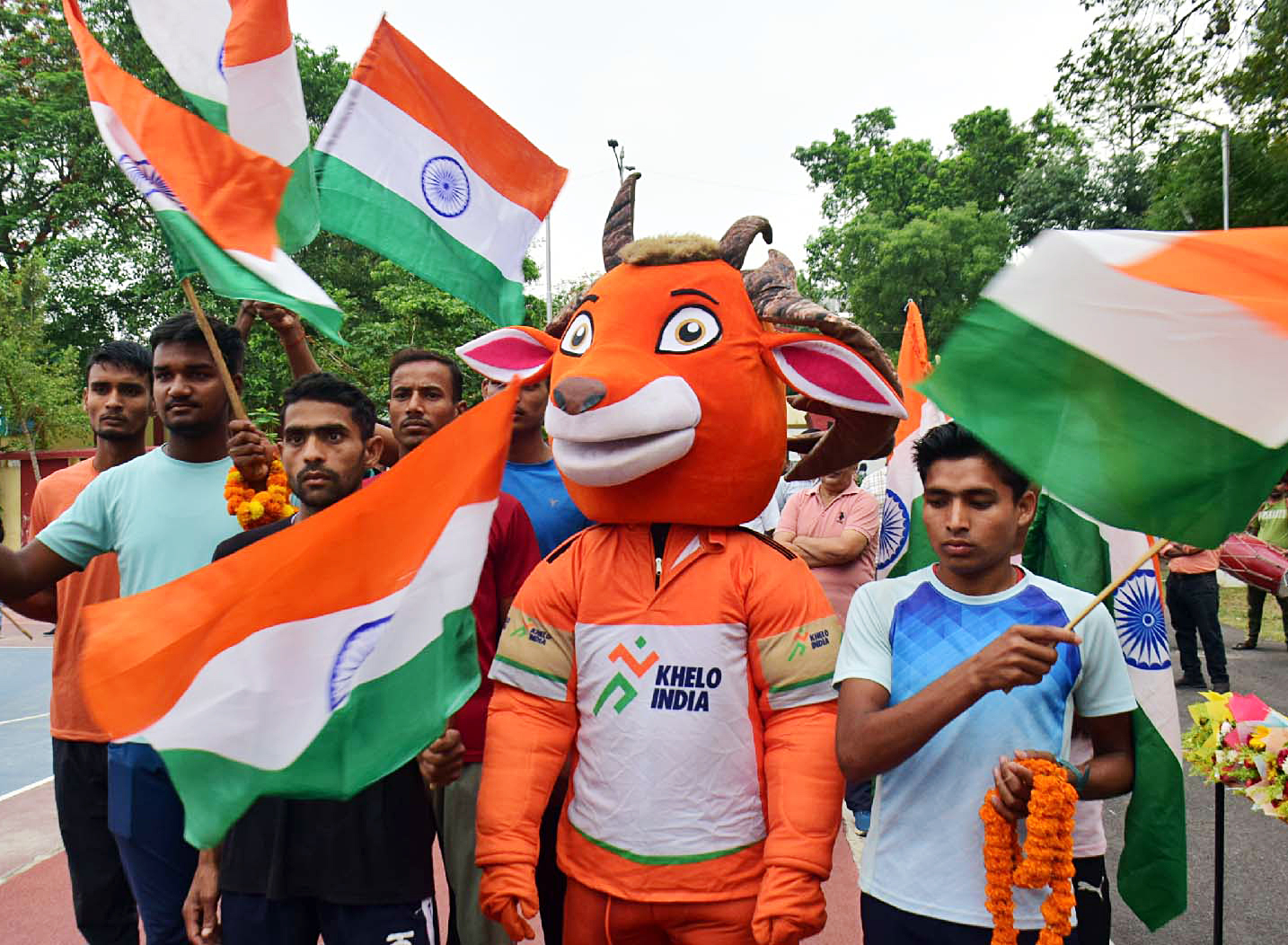 People take part in the 3rd Khelo India University Games’ “Shakti” torch relay.