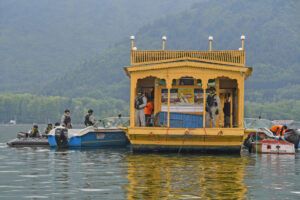 Indian Navy Marine Commandos (MARCOS) patrol in the Dal Lake ahead of the G20 meeting