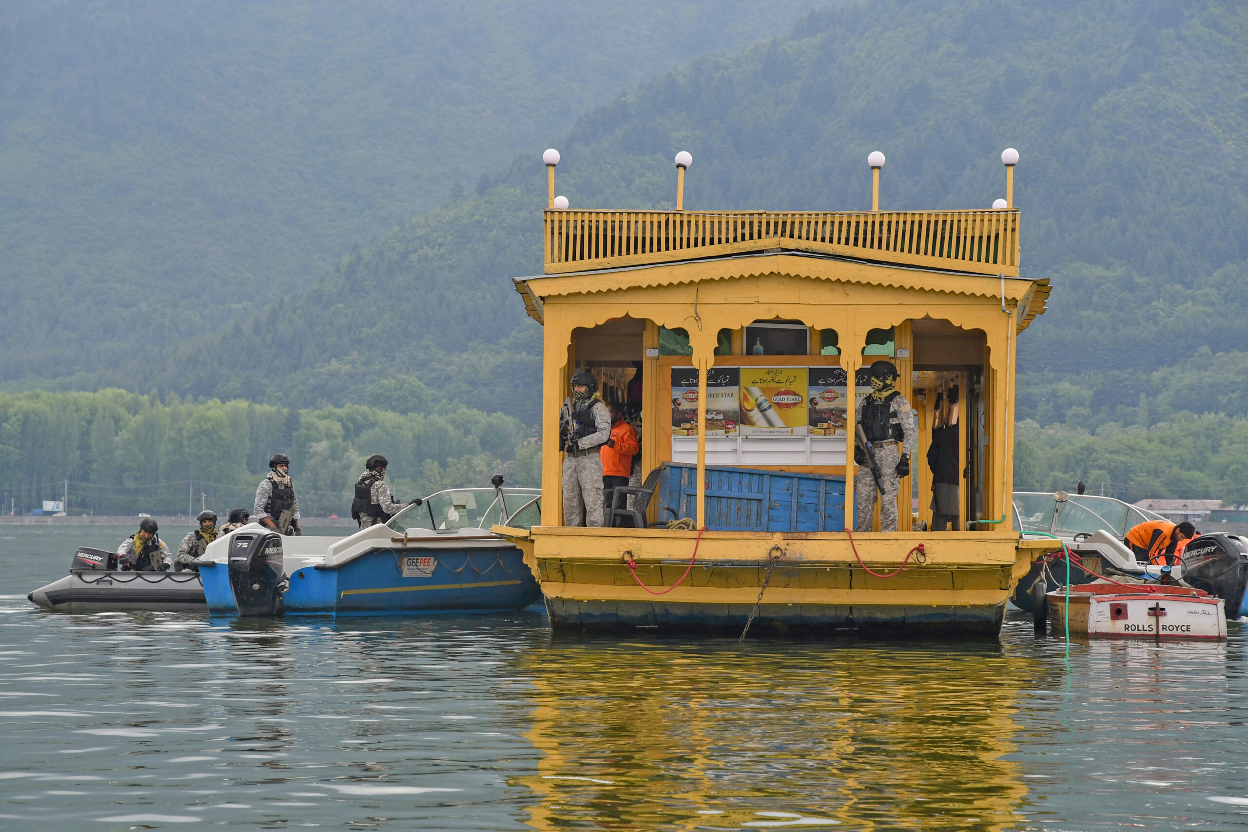 Indian Navy Marine Commandos (MARCOS) patrol in the Dal Lake ahead of the G20 meeting