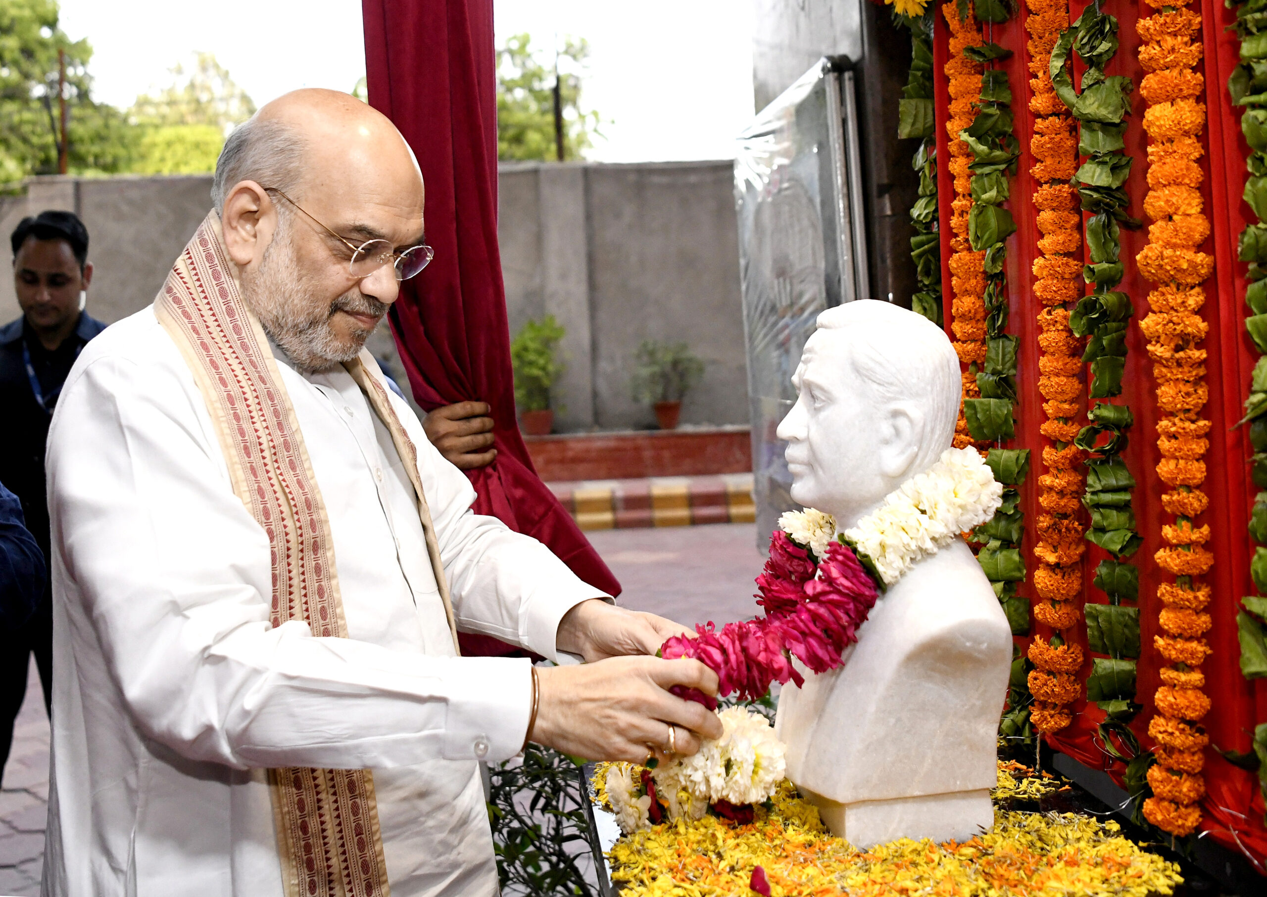 Amit Shah pays floral tributes to Vikram Sarabhai on the completion of 125 years of ‘Delhi Gujrati Samaj’