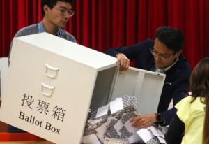 Hong Kong to cut elected seats numbers