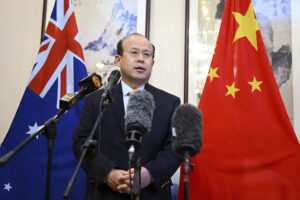 Chinese envoy urges Australia to raise effort to find survivors