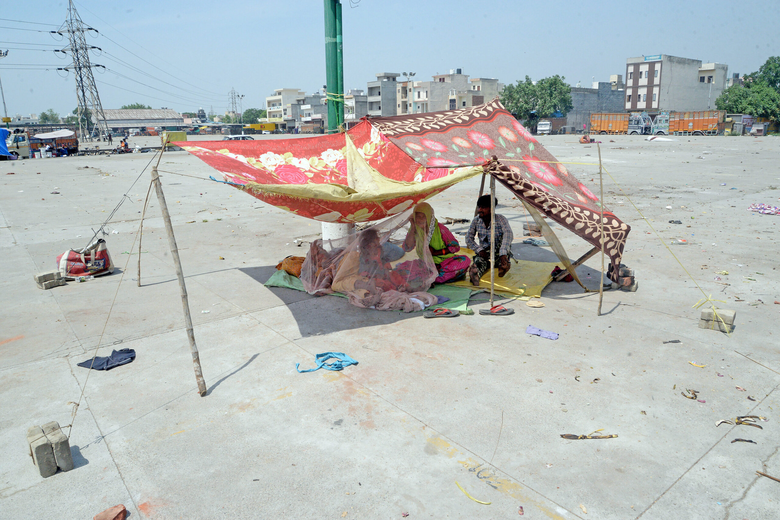 Homeless people rest on hot day in Jalandhar