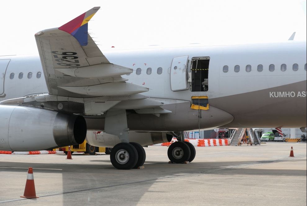 Man held for unlocking emergency door mid-air on South Korean flight