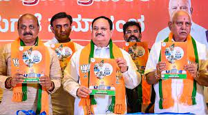 BJP pushes ideological battle in Karnataka; promises UCC, NRC