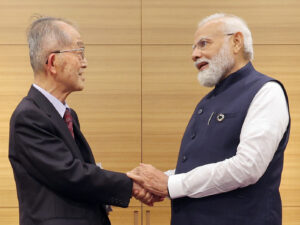 PM Modi meets with renowned Japanese author, Padma Shri awardee Tomio Mizokami in Hiroshima