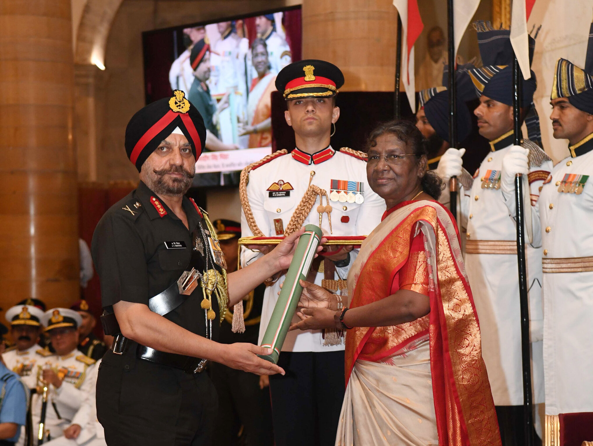 President Droupadi Murmu presents Ati Vishisht Seva Medal during Defence Investiture Ceremony