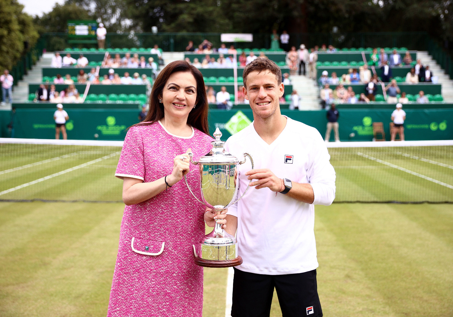 Nita Ambani presents the inaugural Reliance Foundation ESA Cup to Diego Schwartzman