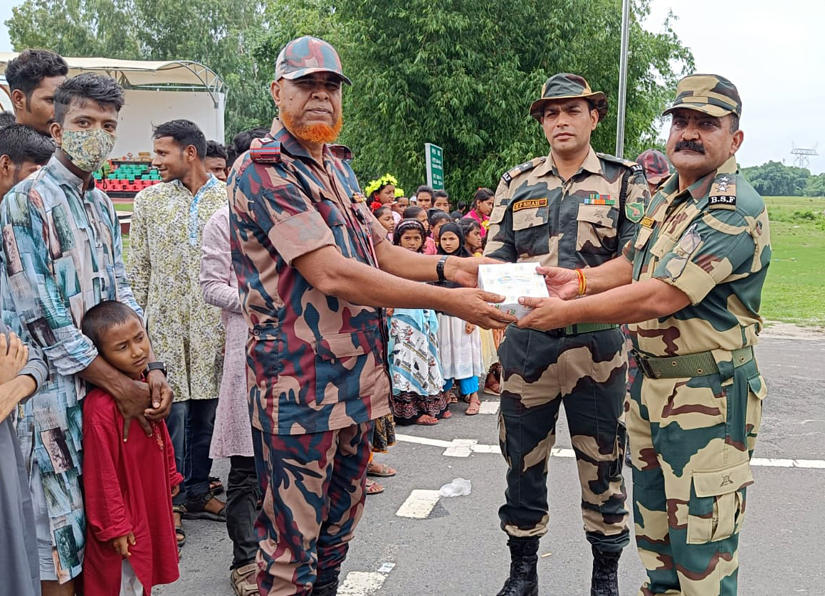 BSF 176 Battalion personnel exchange sweets with BGB personnel on the occasion of Eid-al-Adha