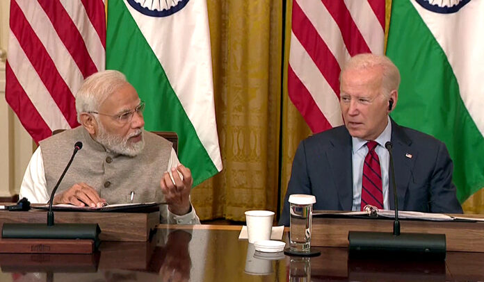 Prime Minister Narendra Modi speaks at a meeting with American and Indian Business leaders, as United States President Joe Biden looks on, at the White House, in Washington, D.C. on 23 June. ANI