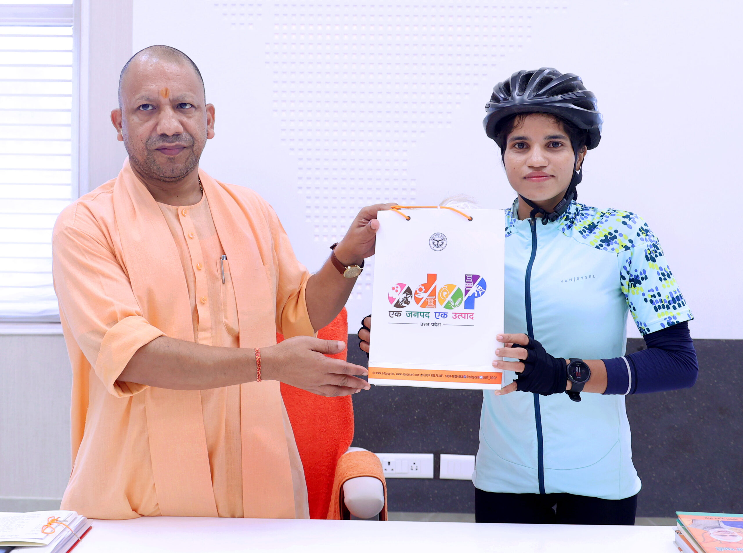 UP CM Yogi Adityanath meets mountaineer and cyclist Asha Malviya