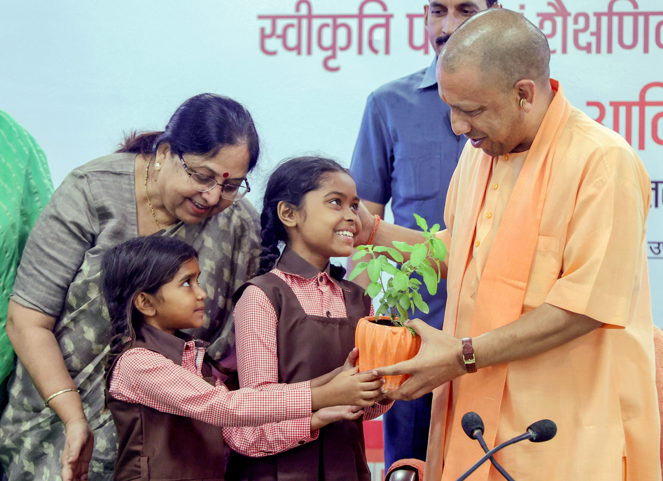 Yogi Adityanath during the distribution of acceptance letter and school kit to children