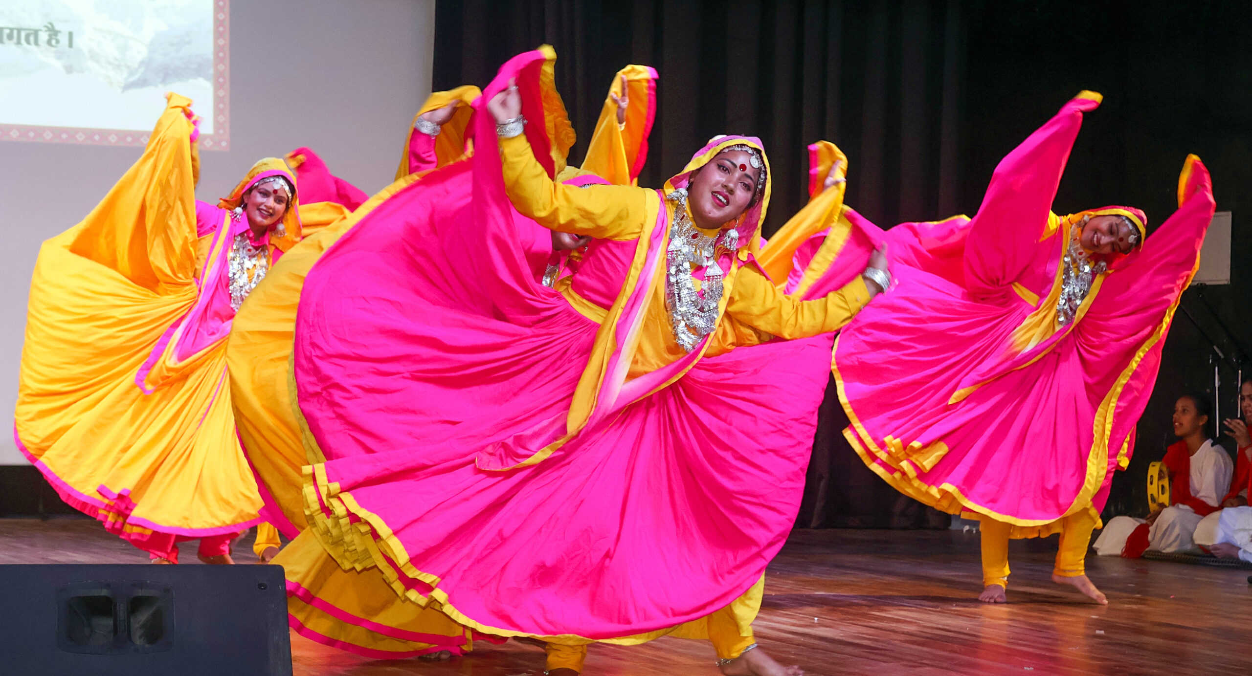 Artists perform folk dance during the event ahead of Guleri Jayanti