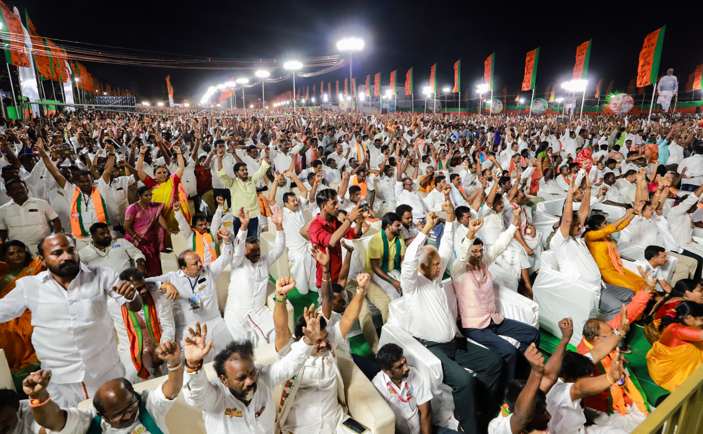 BJP workers attend the flagging off ceremony of the ‘En Mann En Makkal’ Padayatra