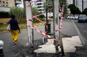 Rioting in French suburbs shows signs of slowing on 6th night