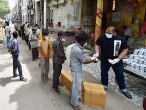 Gaurav distributes food to flood-affected people