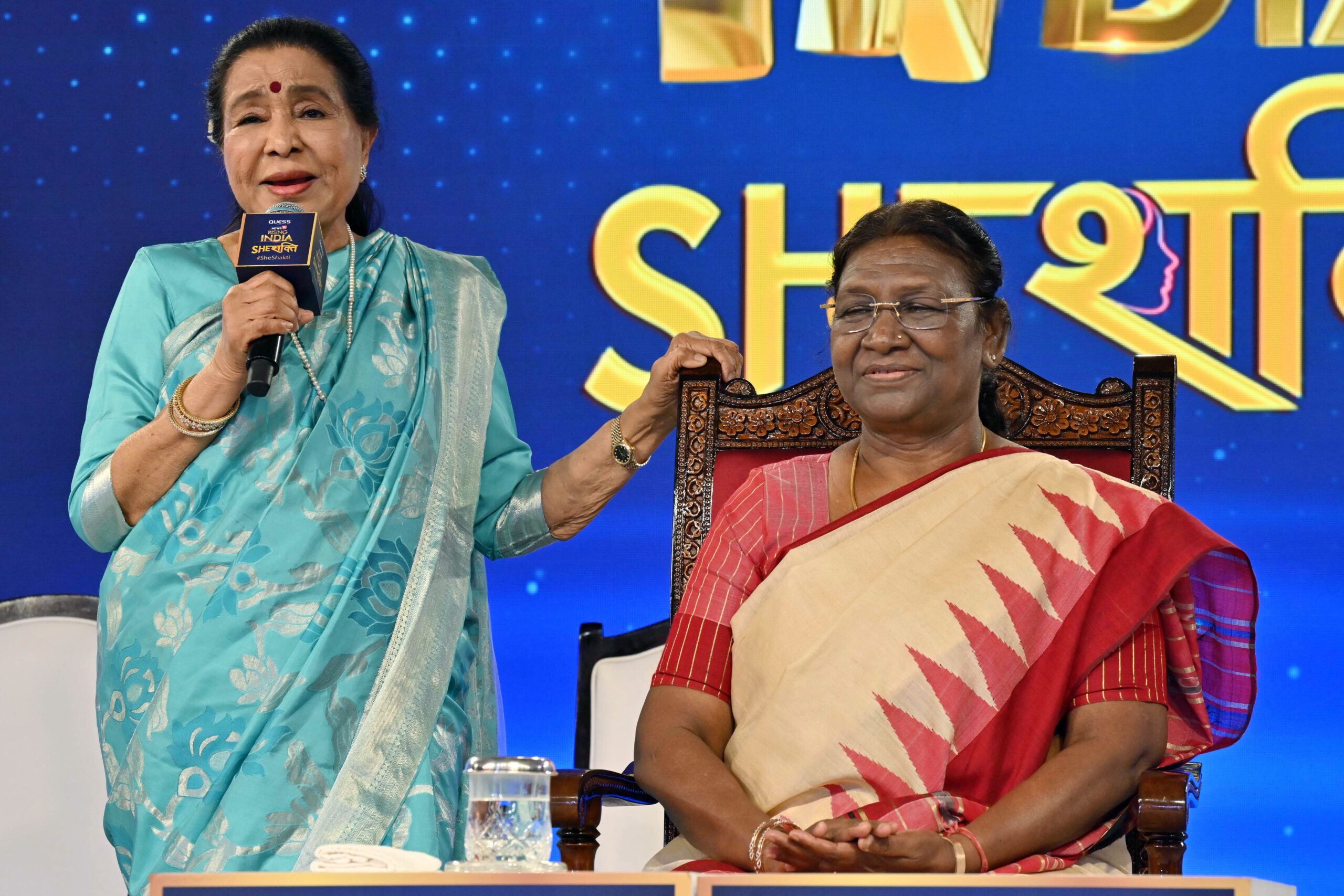 President Droupadi Murmu with legendary singer Asha Bhosle during the function ‘Rising India – She Shakti’