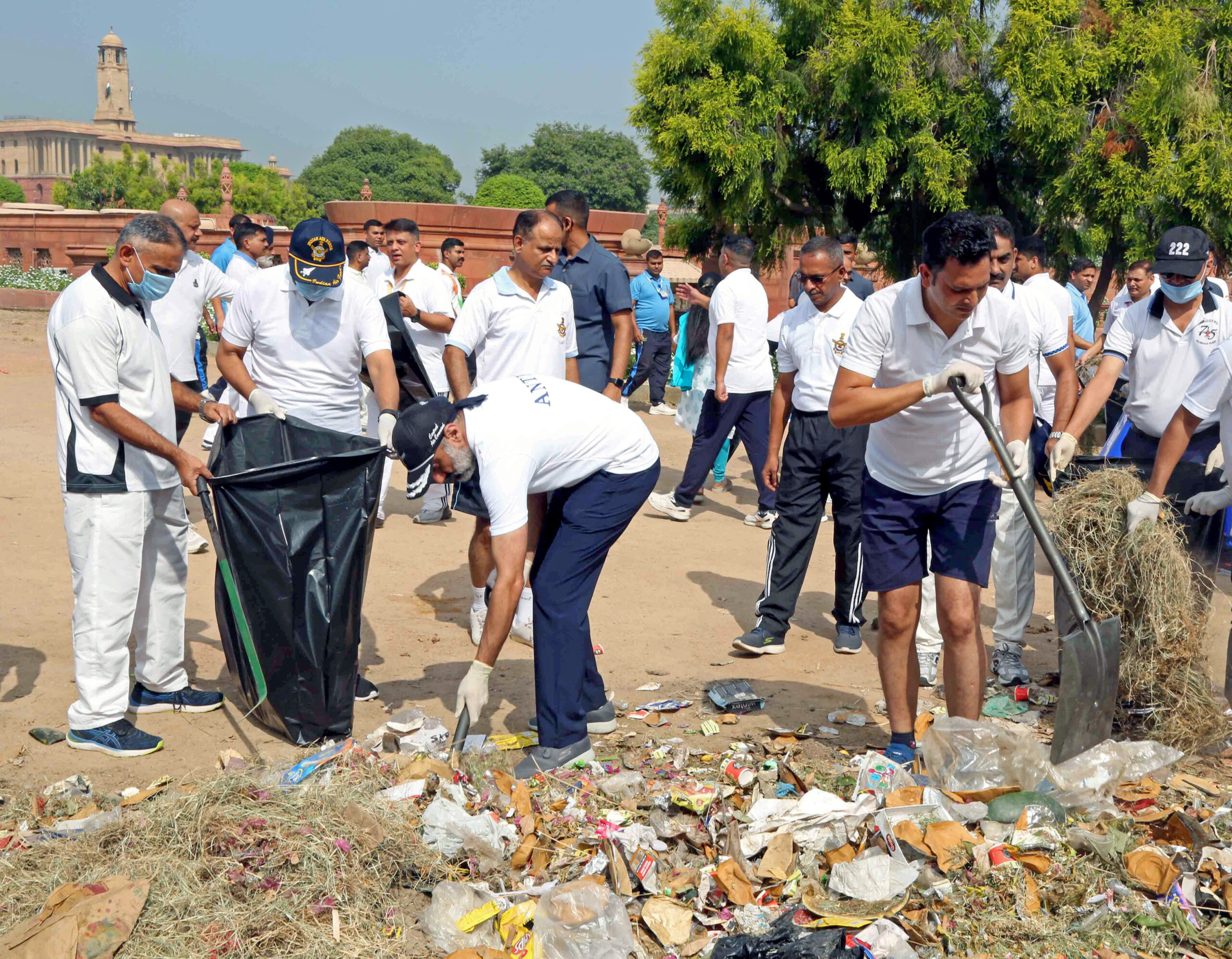 Chief of the Air Staff, Air Chief Marshal VR Chaudhari takes part in the ‘Ek Tareekh Ek Ghanta’ cleanliness drive, in New Delhi on Sunday. ANI