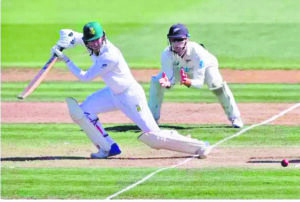 South Africa holds ground after Ravindra’s triple strike