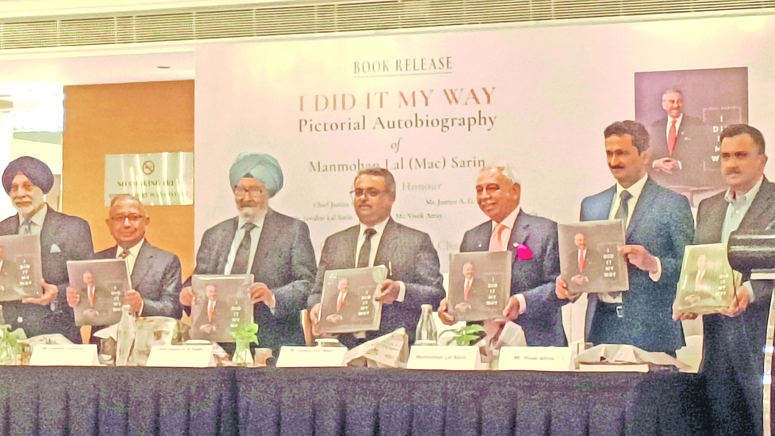 (L-R)Noni Chawla, elder brother Jawahar Sarin exIAS, former Allahabad Chief Justice S.S. Sodhi, chief guest Supreme Court Judge Justice A.S.Masih, Mac Sarin, Vivek Atray, and publisher Sanjay Sethi
