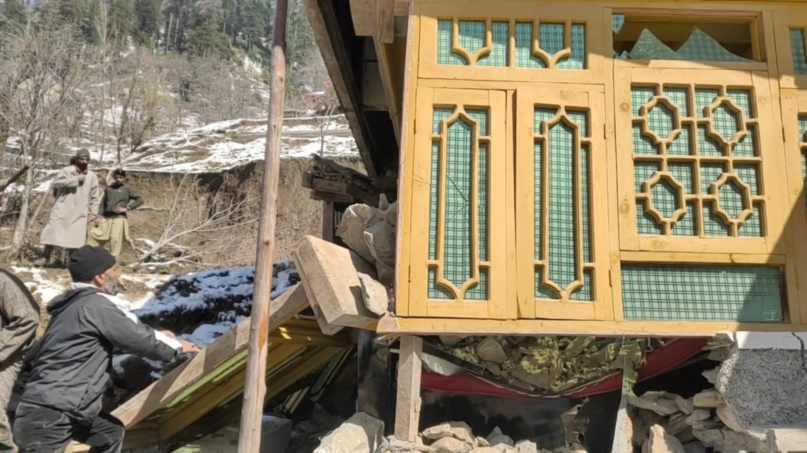 Heavy rains trigger landslides in north Kashmir many structures damaged