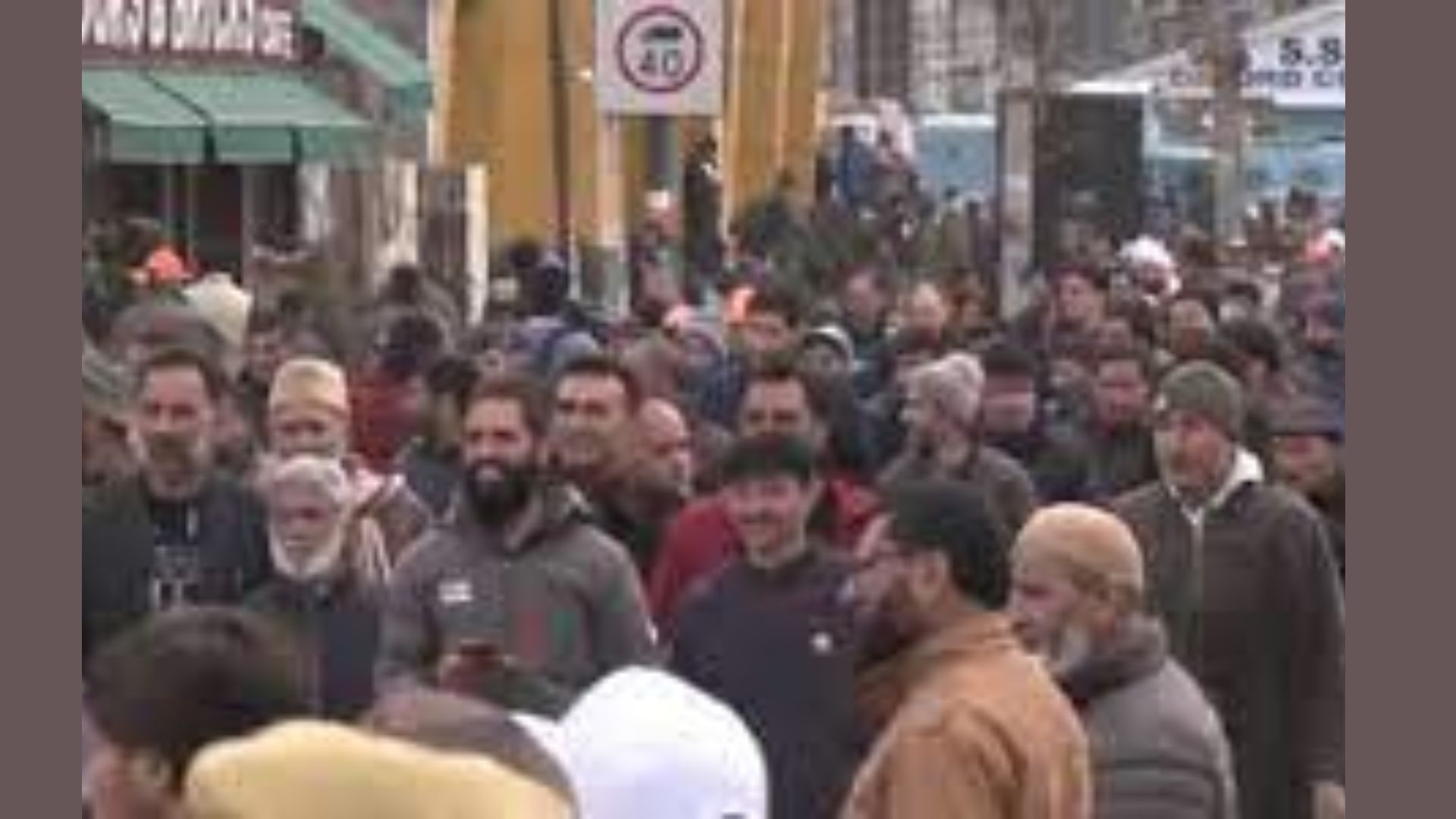 Hundreds of people gather outside Srinagar’s Bakshi stadium to attend PM Modi’s rally