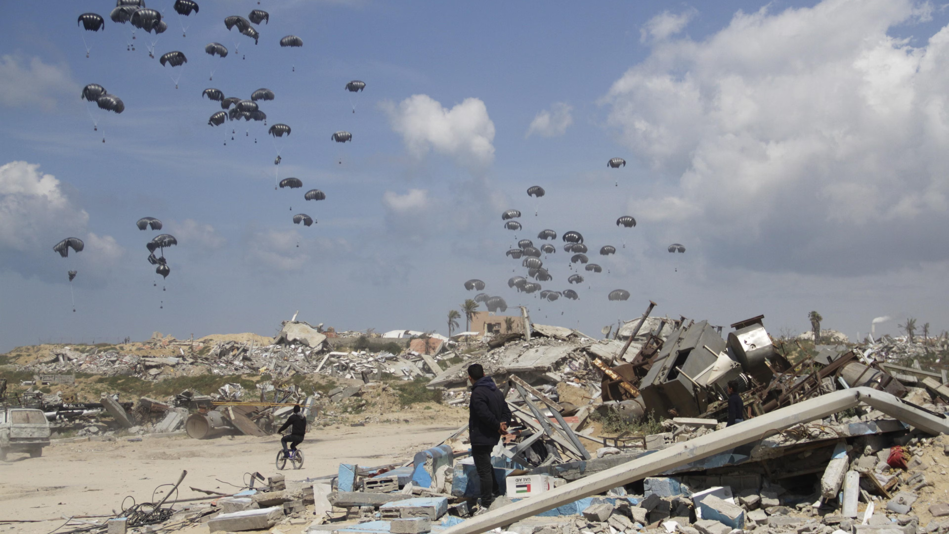 Israel airstrikes kill 13, including 9 children, amid US aid