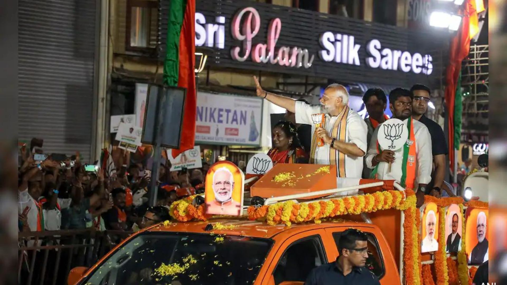 PM Modi waves in a roadshow in Chennai