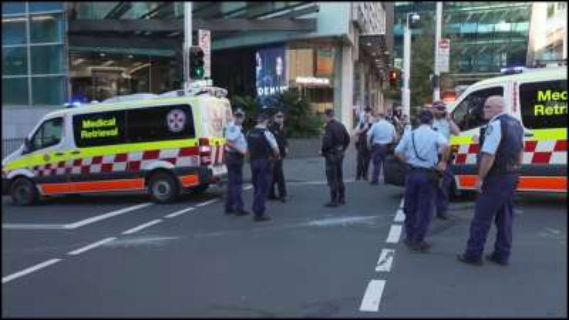 Police at the shooting-stabbing site in Sydney
