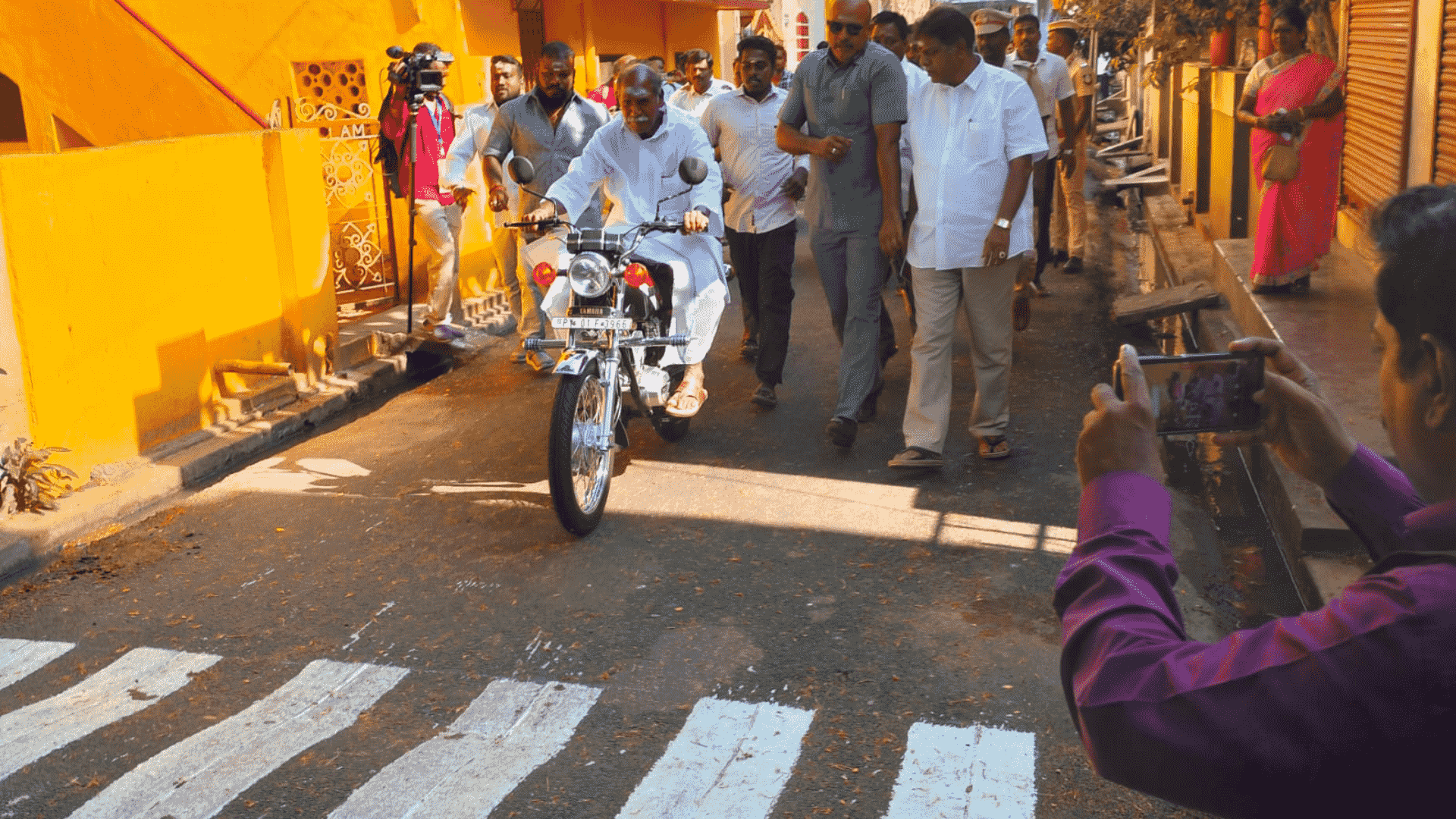 Puducherry CM Rangaswamy rode Bike to Polling Booth