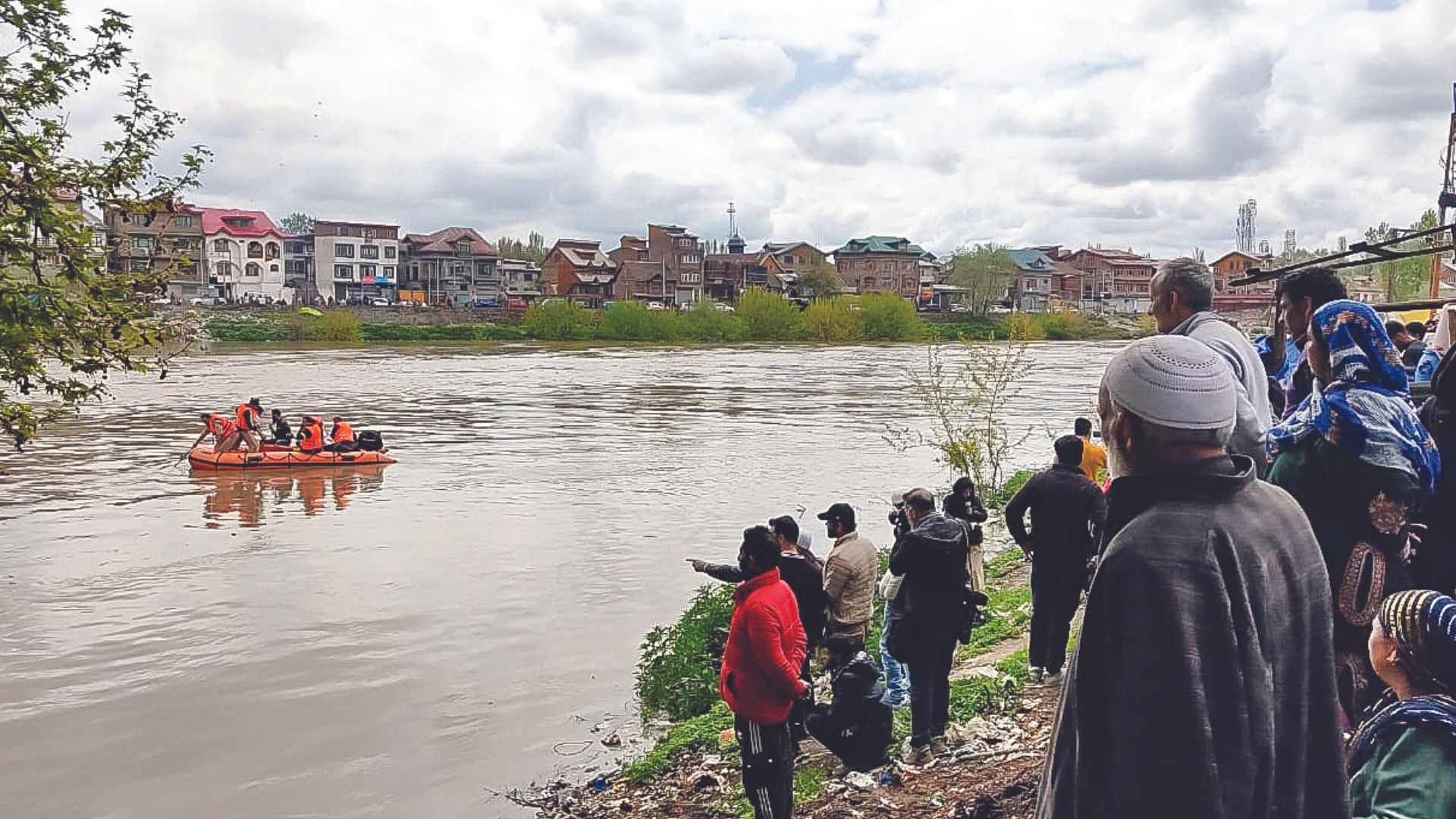 SDRF team conduct rescue operations after a boat carrying school children capsized in the Jhelum river, at Gandbal in Srinagar on Tuesday. ANI
