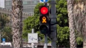 Watch: Traffic Light In Israel Features Yellow Ribbon To Raise Awareness Of Gaza Hostages